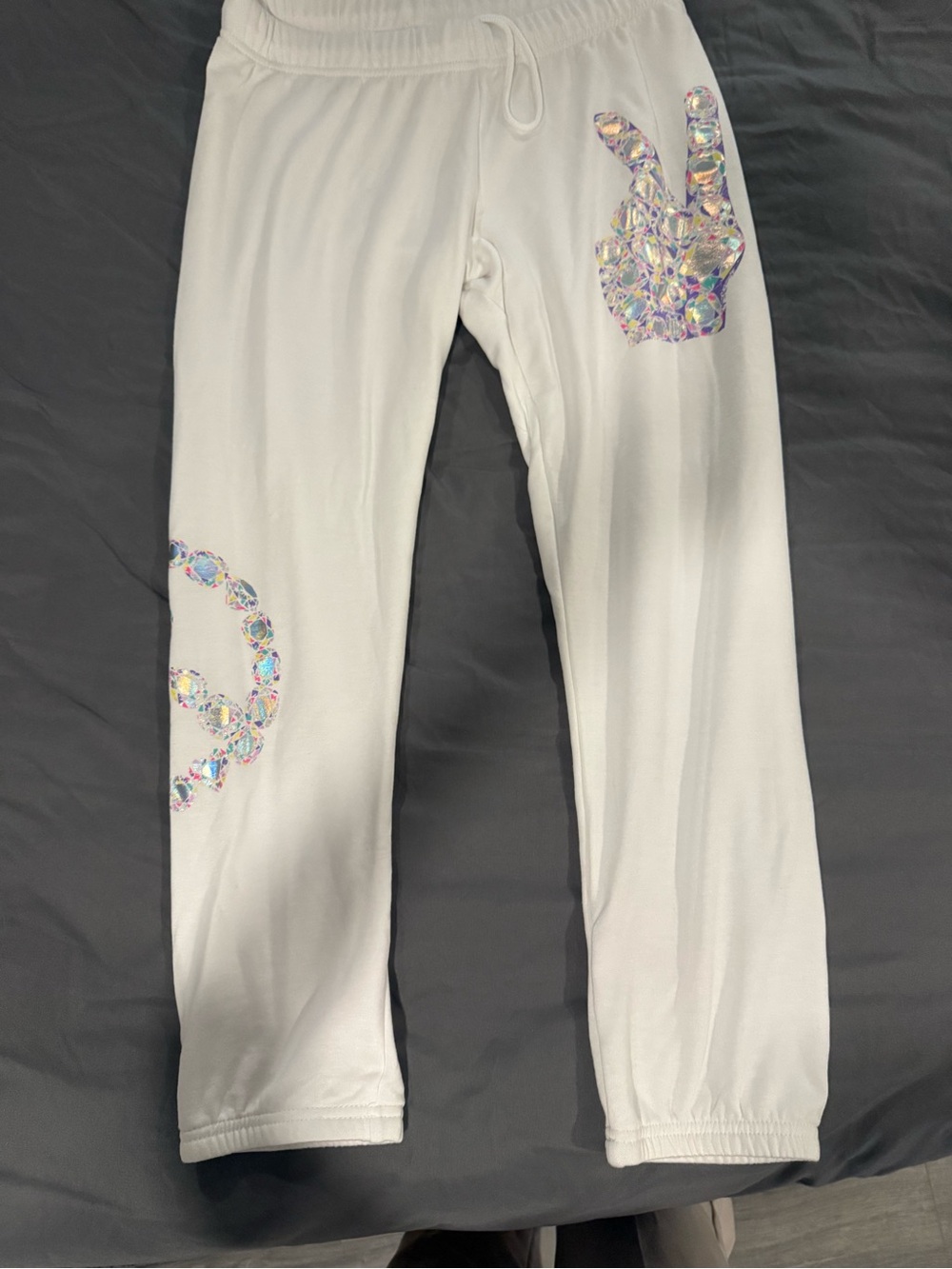 White Holographic Peace Sign Jogger Pants